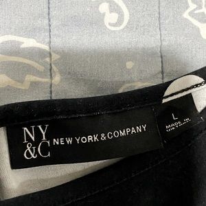 Flared, black with white polka dots dress